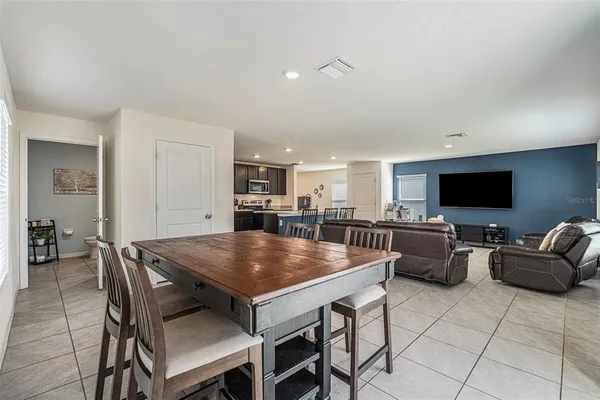 a view of a dining room with furniture