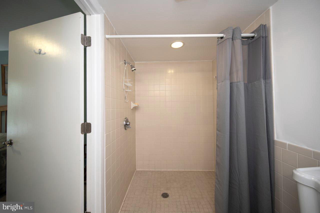 33 Gloucester Road Ocean Pines, MD 21811 - Photo 25 of 31 Full Bath on Main Level with Roll in Shower