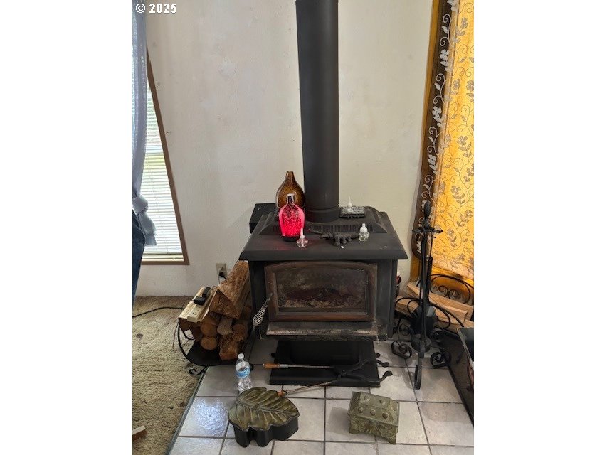 56399 Christopher Road Bandon, OR 97411 - Photo 16 of 34 a living room with furniture and a wooden floor