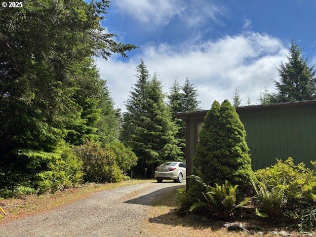 56399 Christopher Road Bandon, OR 97411 - Photo 24 of 34 a view of a garden with lake view