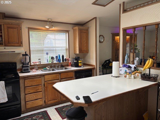 56399 Christopher Road Bandon, OR 97411 - Photo 6 of 34 a large kitchen with kitchen island a stove a sink a dining table and chairs