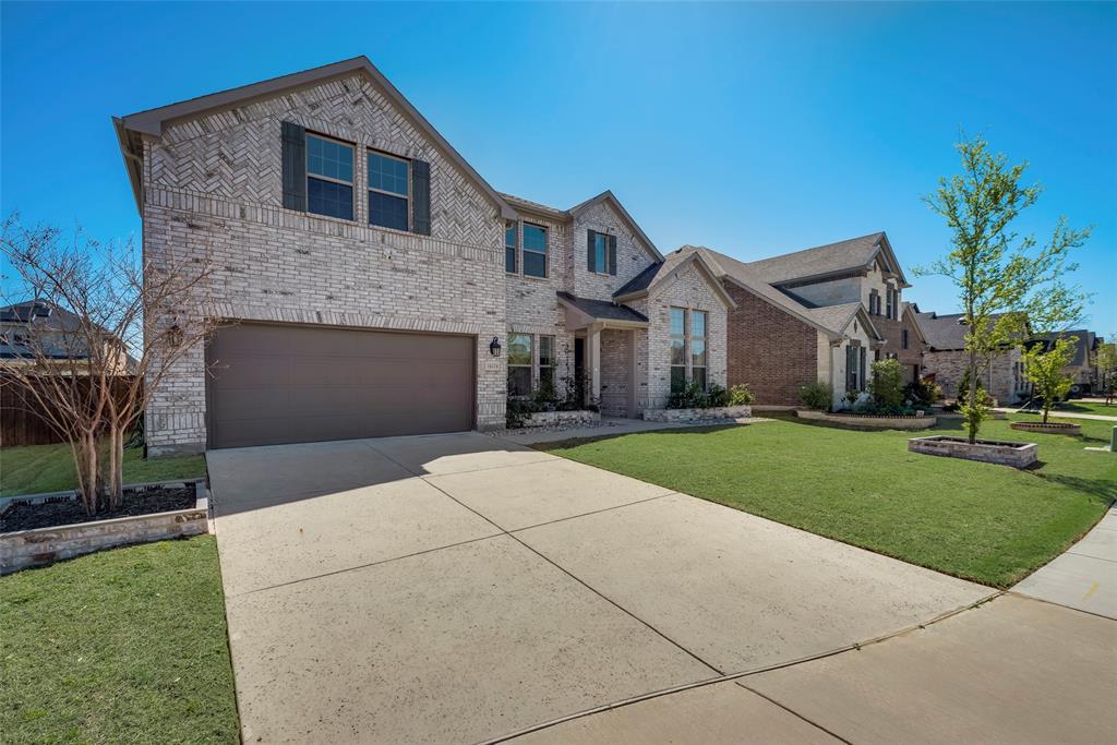 16476 Ryder Rock Road Frisco, TX 75033 - Photo 2 of 40 Three car tandem garage w/ epoxy flooring