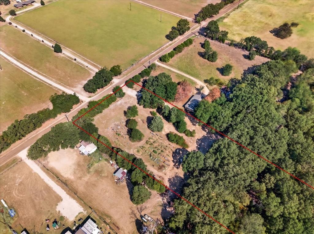 Expansive acreage featuring significant tree coverage and clear areas