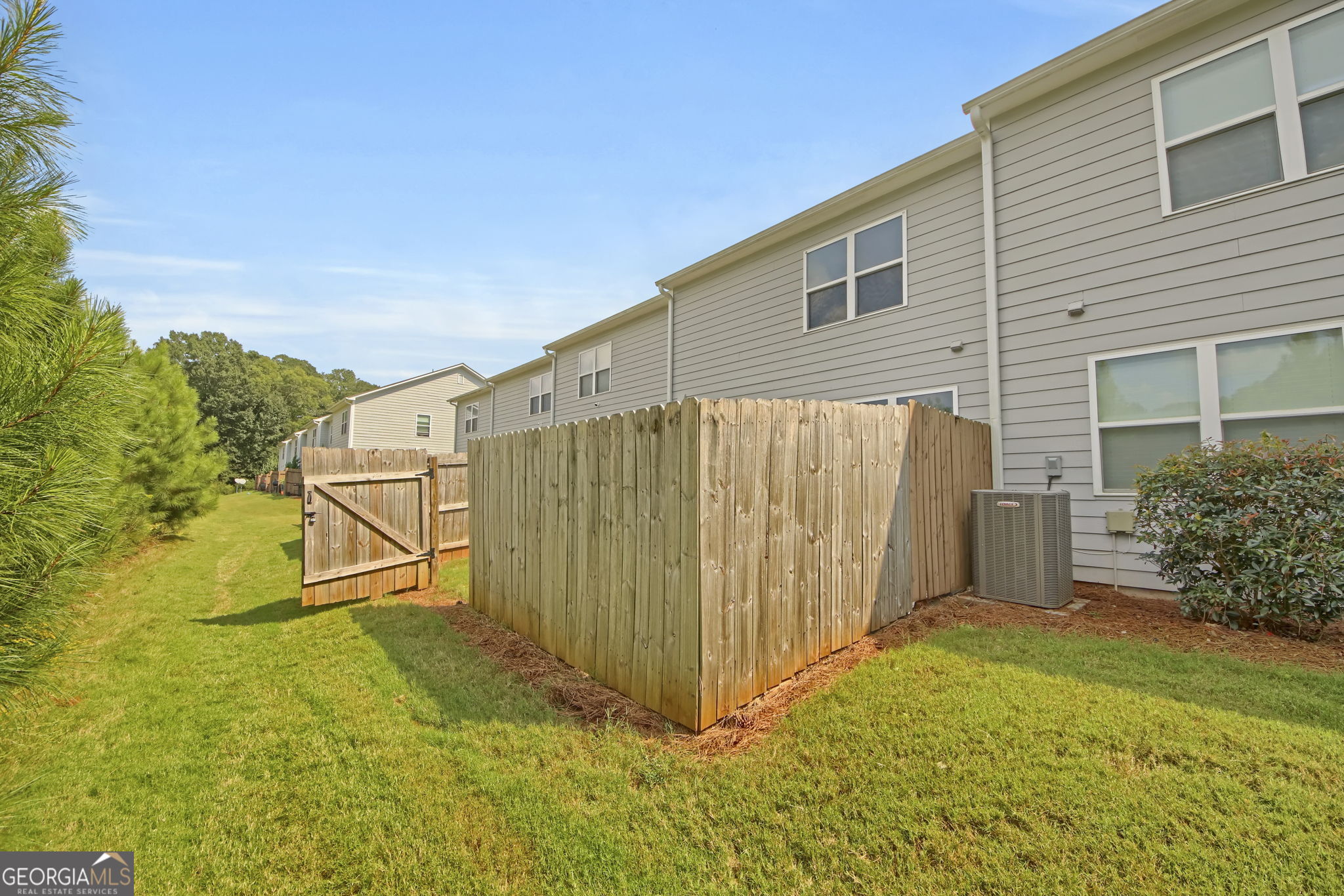 11924 Fuller Street Hampton, GA 30228 - Photo 26 of 26 a view of backyard with garden