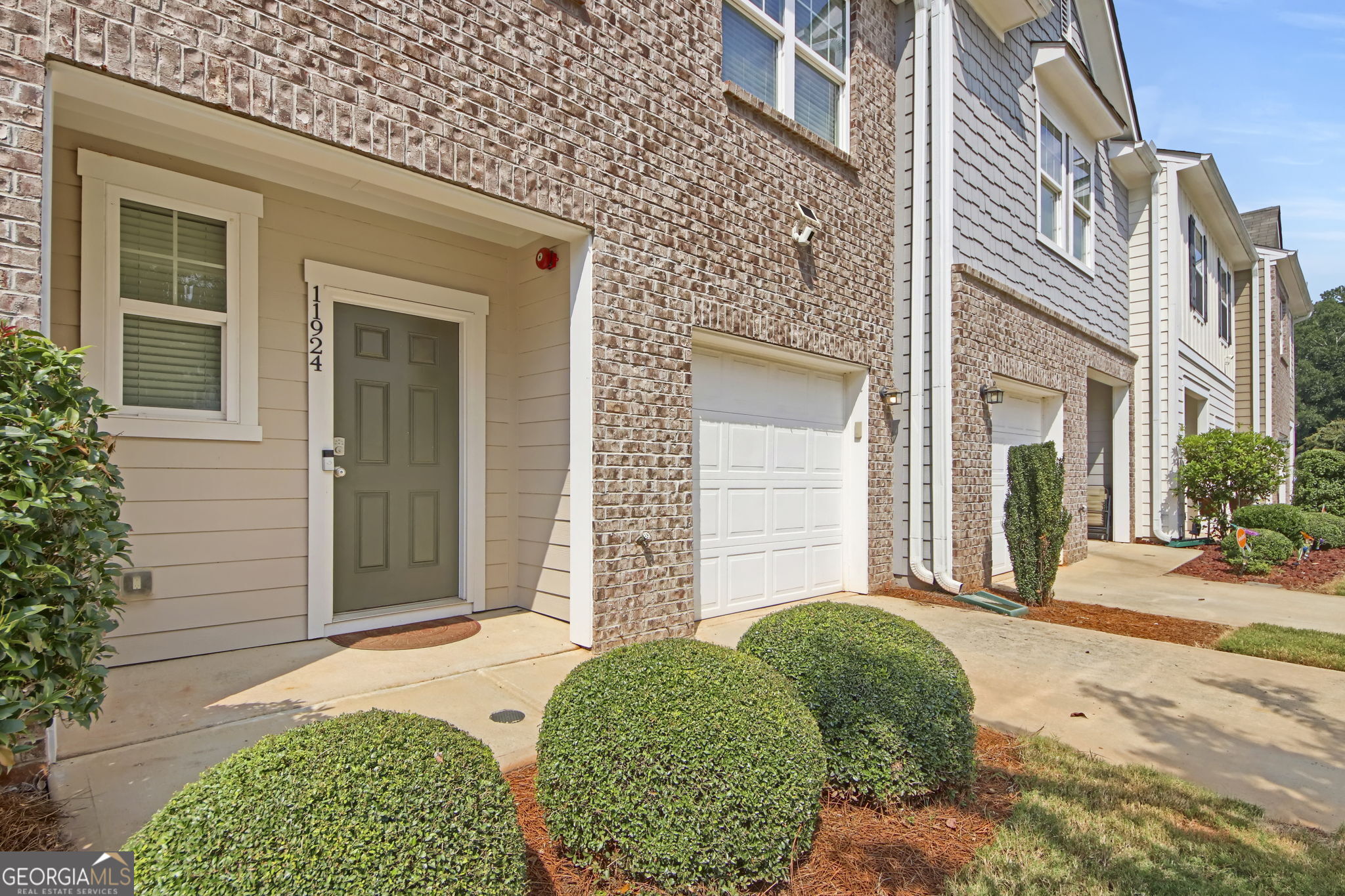 11924 Fuller Street Hampton, GA 30228 - Photo 3 of 26 front view of a house with a yard