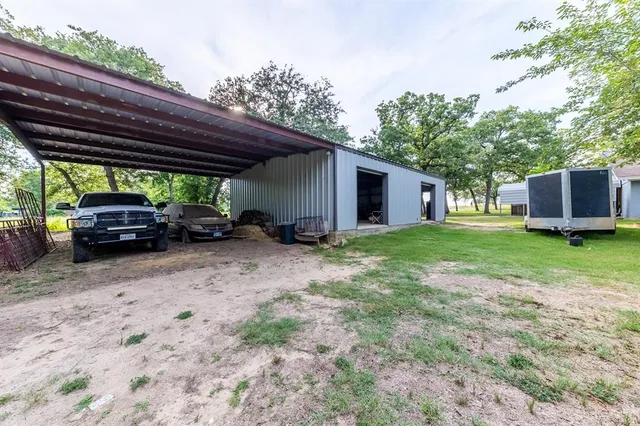 a view of a house with a back yard