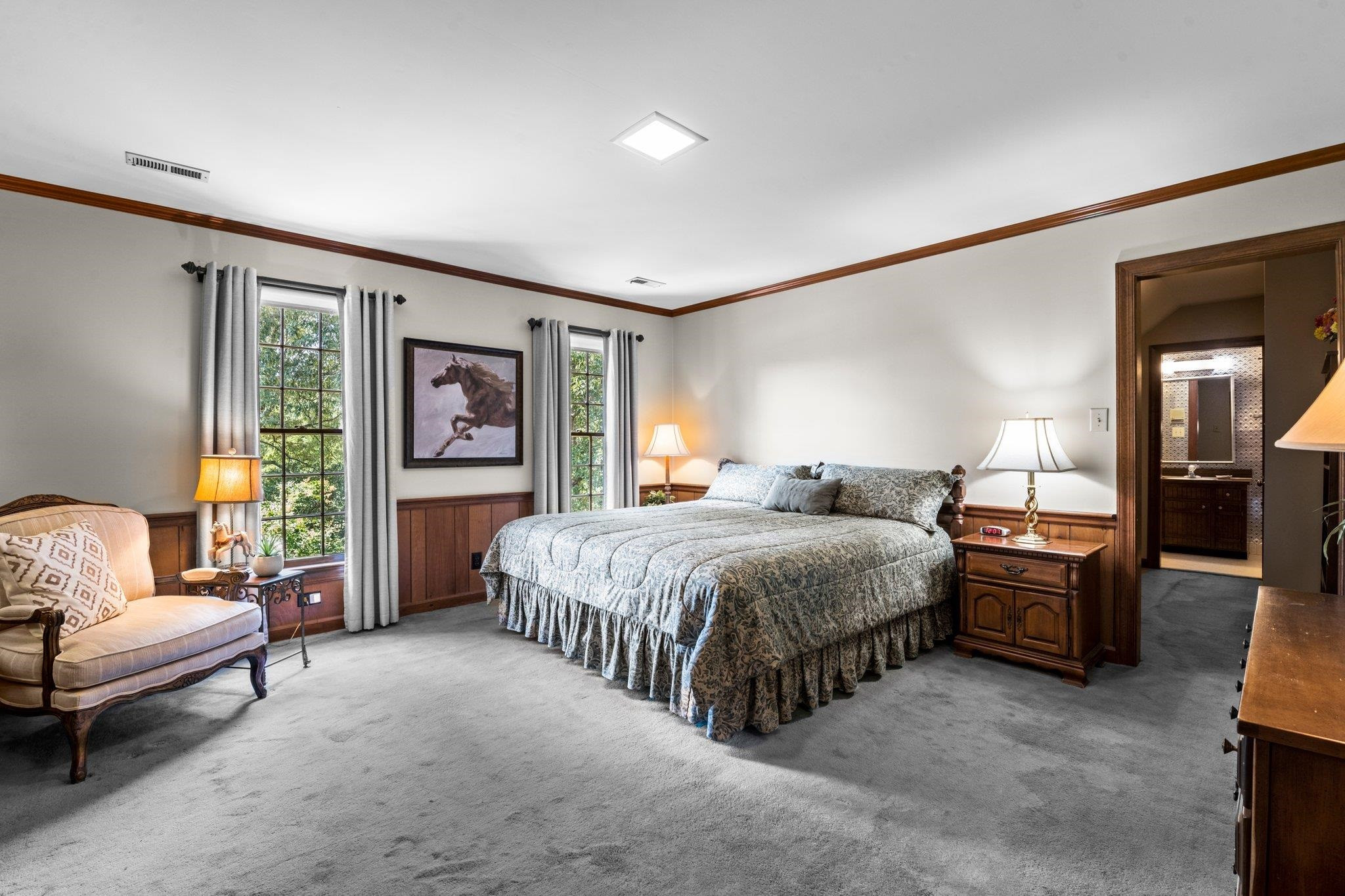 5101 Holly Ridge Farm Road Raleigh, NC 27616 - Photo 34 of 63 Bedroom 3 features walk-in closet, additional walk-in attic storage space, an en suite bathroom, and built-ins around a desk for studying. Bedroom 3