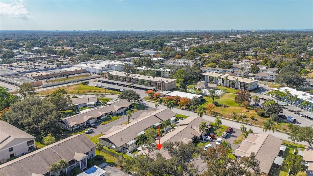 1417 Heather Ridge Boulevard Dunedin, FL 34698 - Photo 31 of 37 an aerial view of residential houses with outdoor space