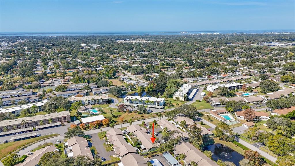 1417 Heather Ridge Boulevard Dunedin, FL 34698 - Photo 32 of 37 an aerial view of multiple house