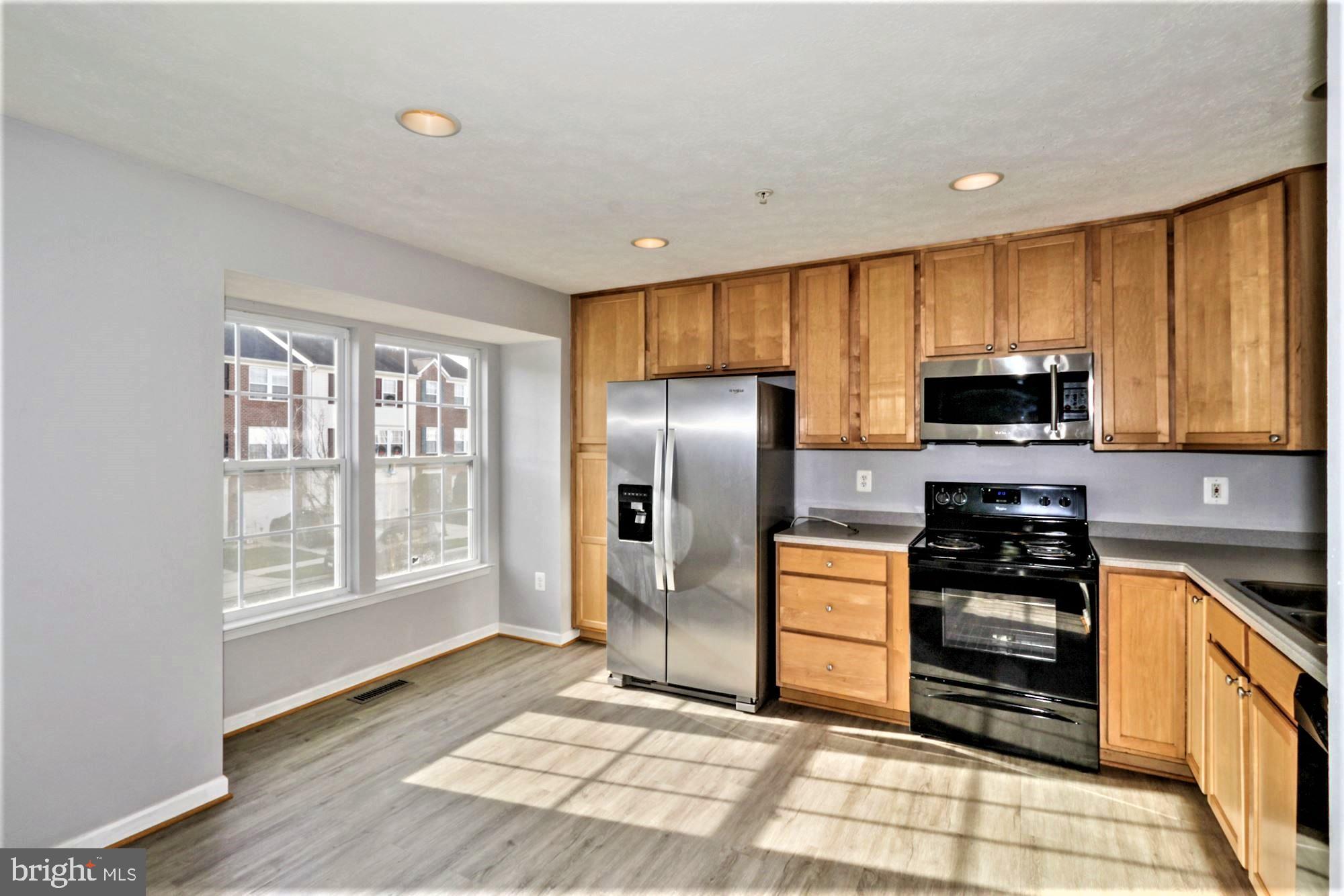9840 Decatur Road Baltimore, MD 21220 - Photo 14 of 28 Kitchen has Eat-in Dinette Area