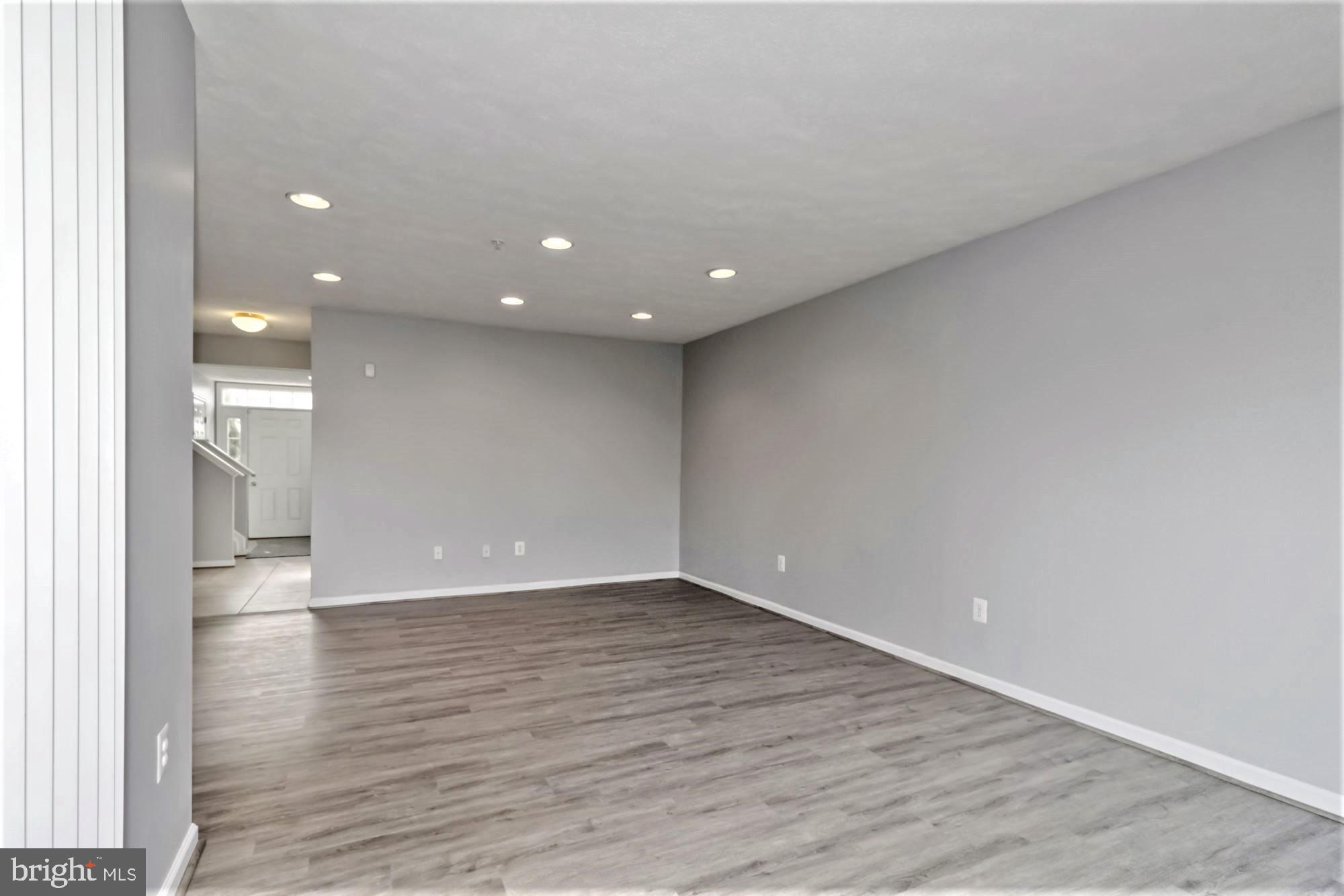 9840 Decatur Road Baltimore, MD 21220 - Photo 5 of 28 Lower Level Great Room looking towards front door