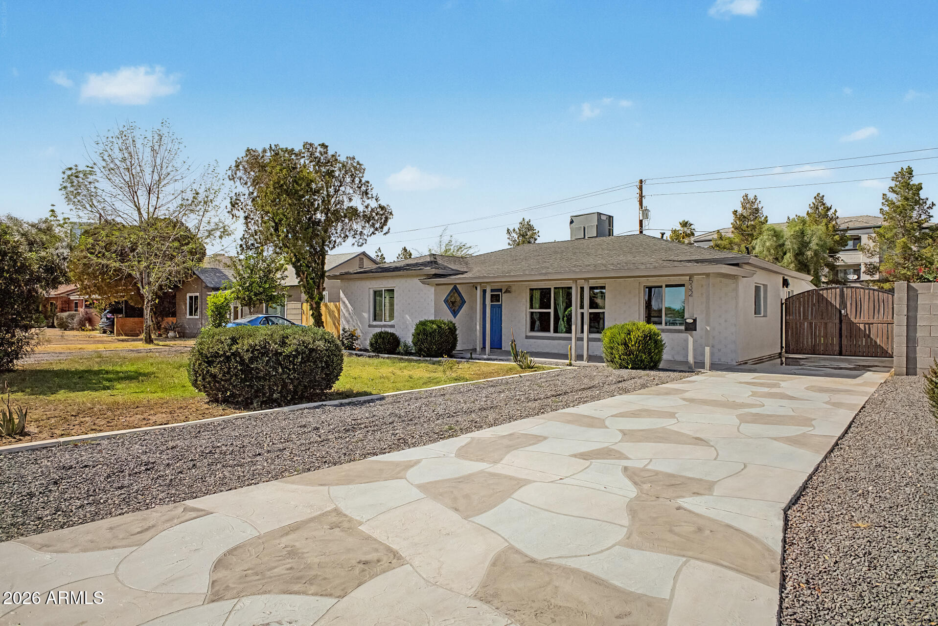532 East Cheery Lynn Road Phoenix, AZ 85014 - Photo 3 of 37 a front view of a house with a yard and potted plants