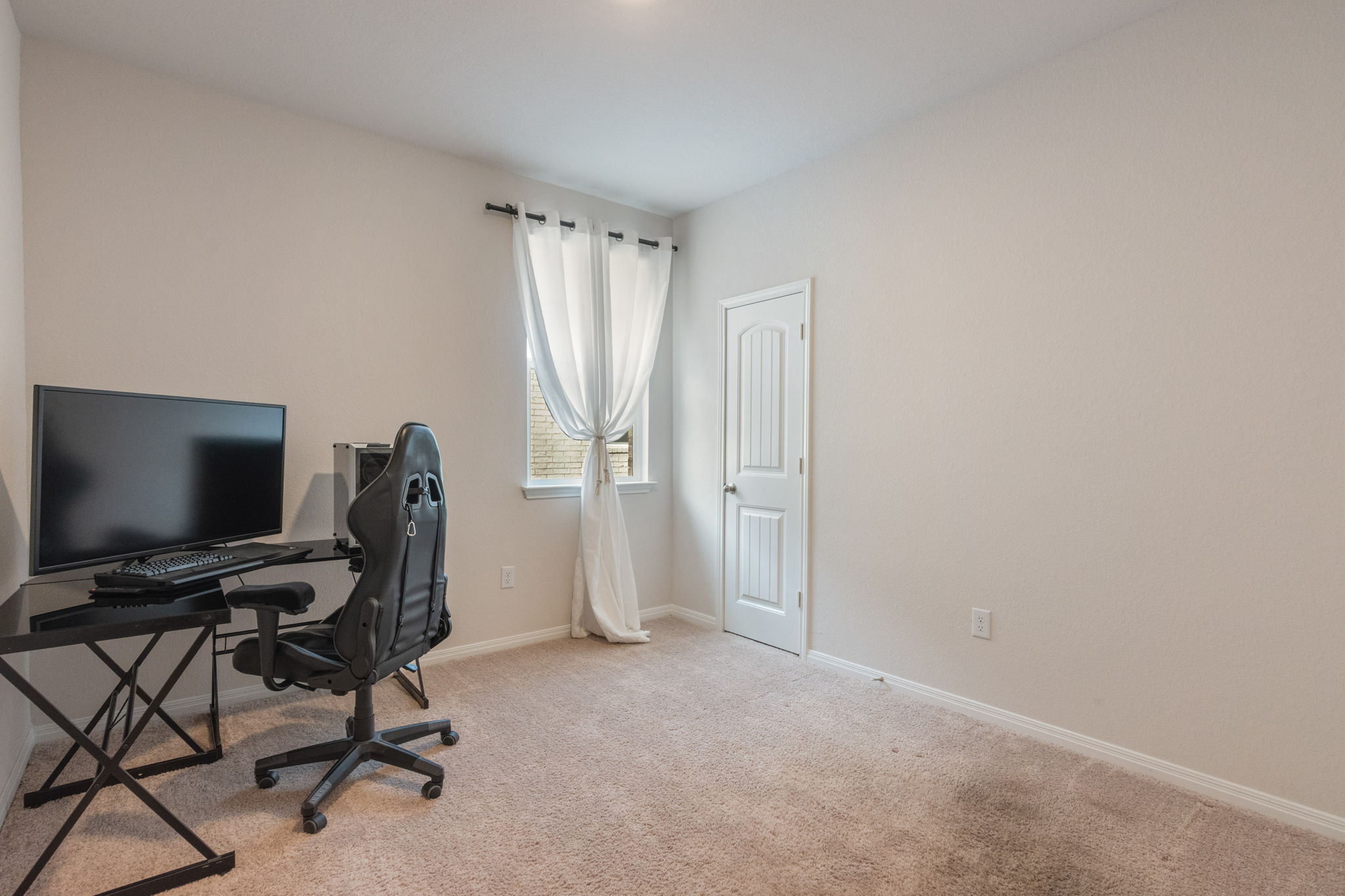 205 Charles Trail Georgetown, TX 78626 - Photo 21 of 36 Office area with light carpet and baseboards