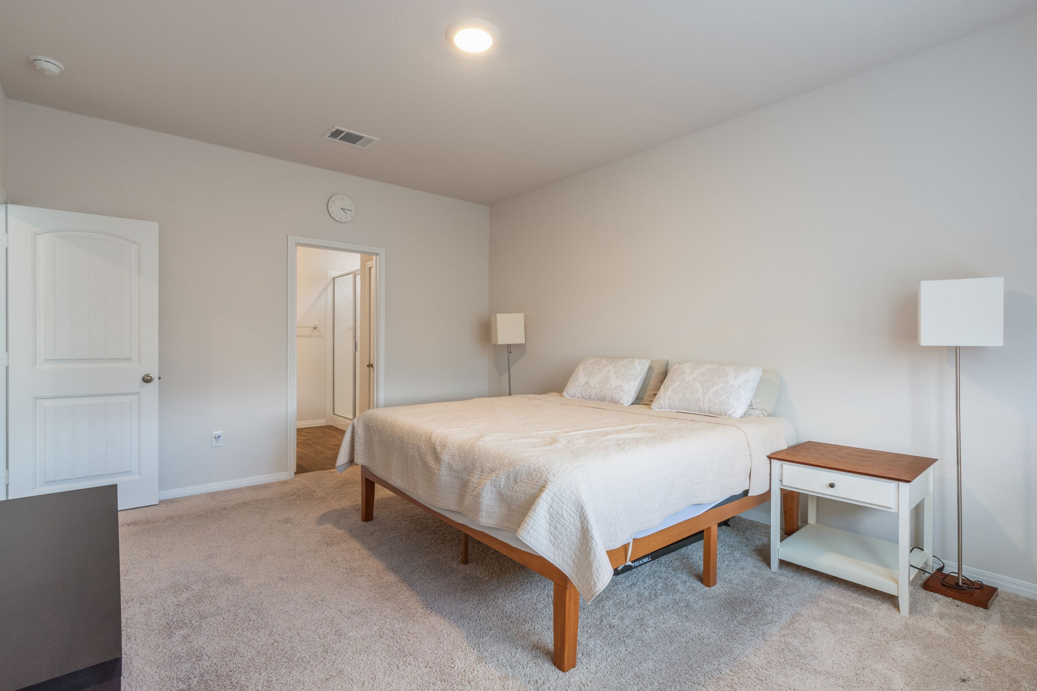 205 Charles Trail Georgetown, TX 78626 - Photo 24 of 36 Bedroom with light colored carpet and baseboards