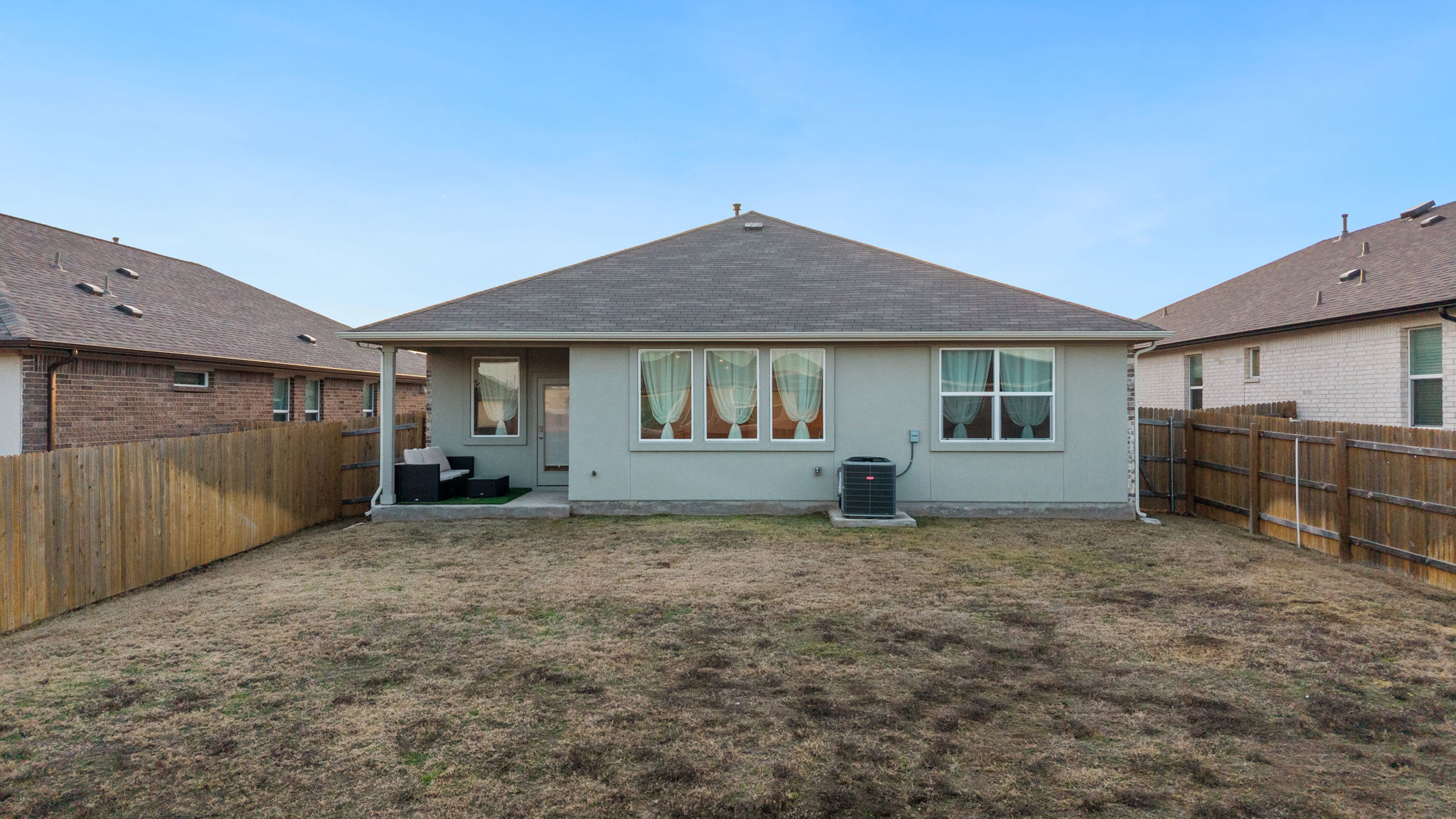 205 Charles Trail Georgetown, TX 78626 - Photo 31 of 36 Back of house featuring a patio area and a fenced backyard
