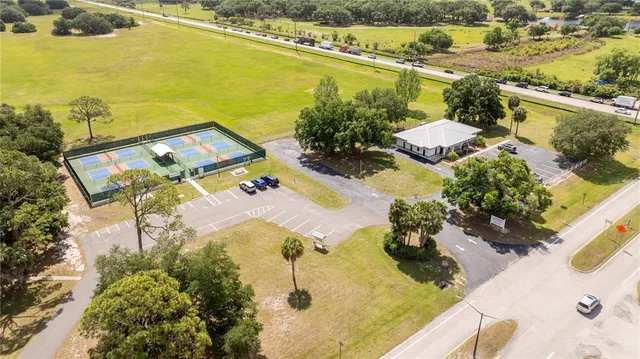 an aerial view of a house with a ocean view