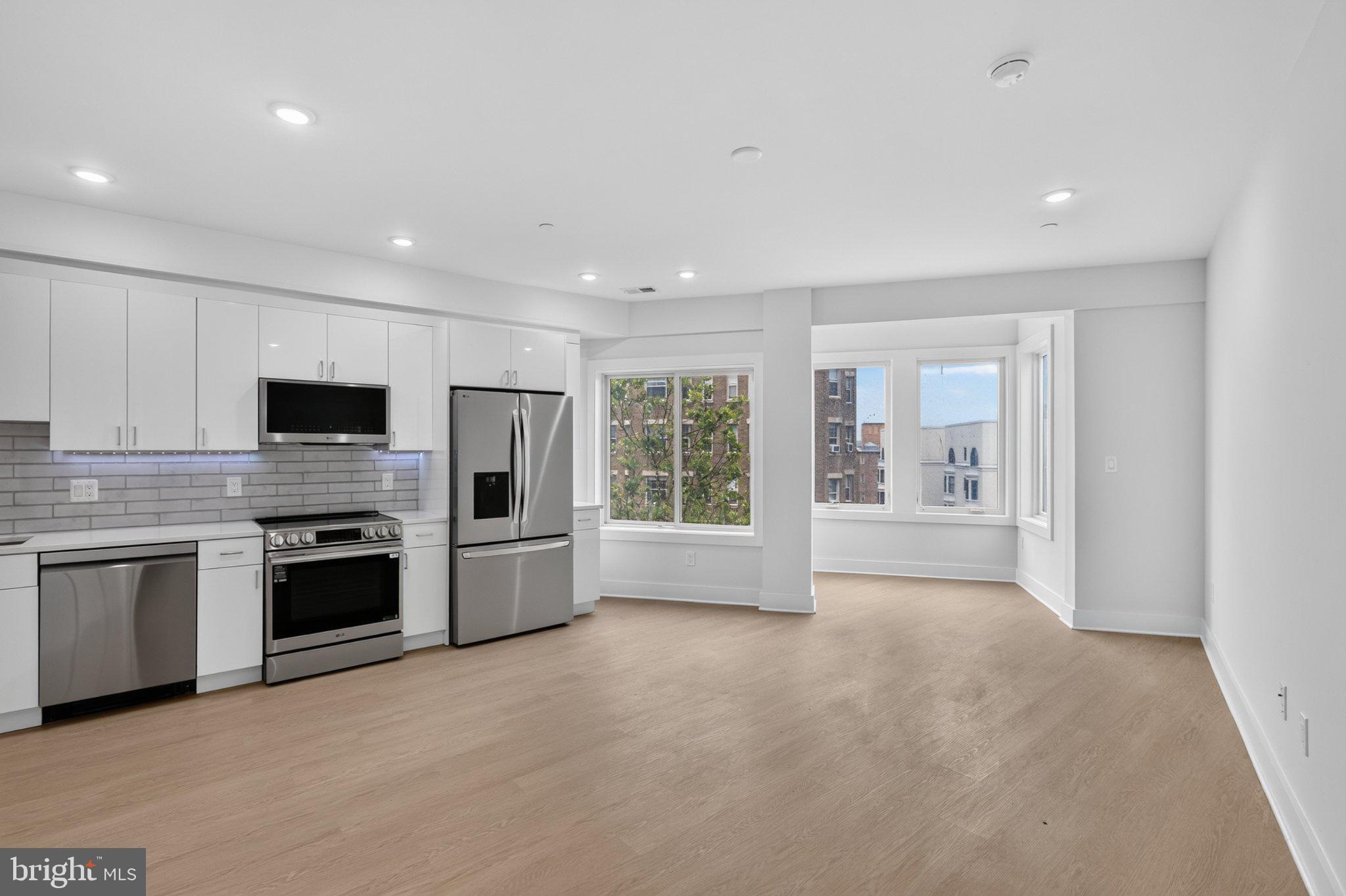 Bright, modern kitchen with city views.