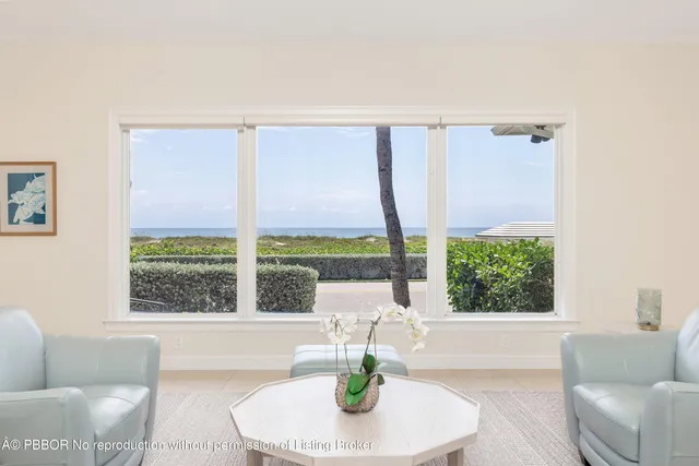 a spacious bedroom with a bed and a flat screen tv