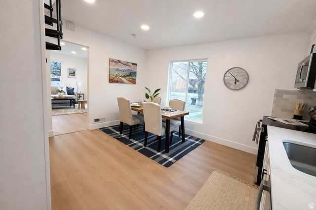 266 700 West Provo, UT 84601 - Photo 6 of 18 Dining area with light wood-style flooring and recessed lighting