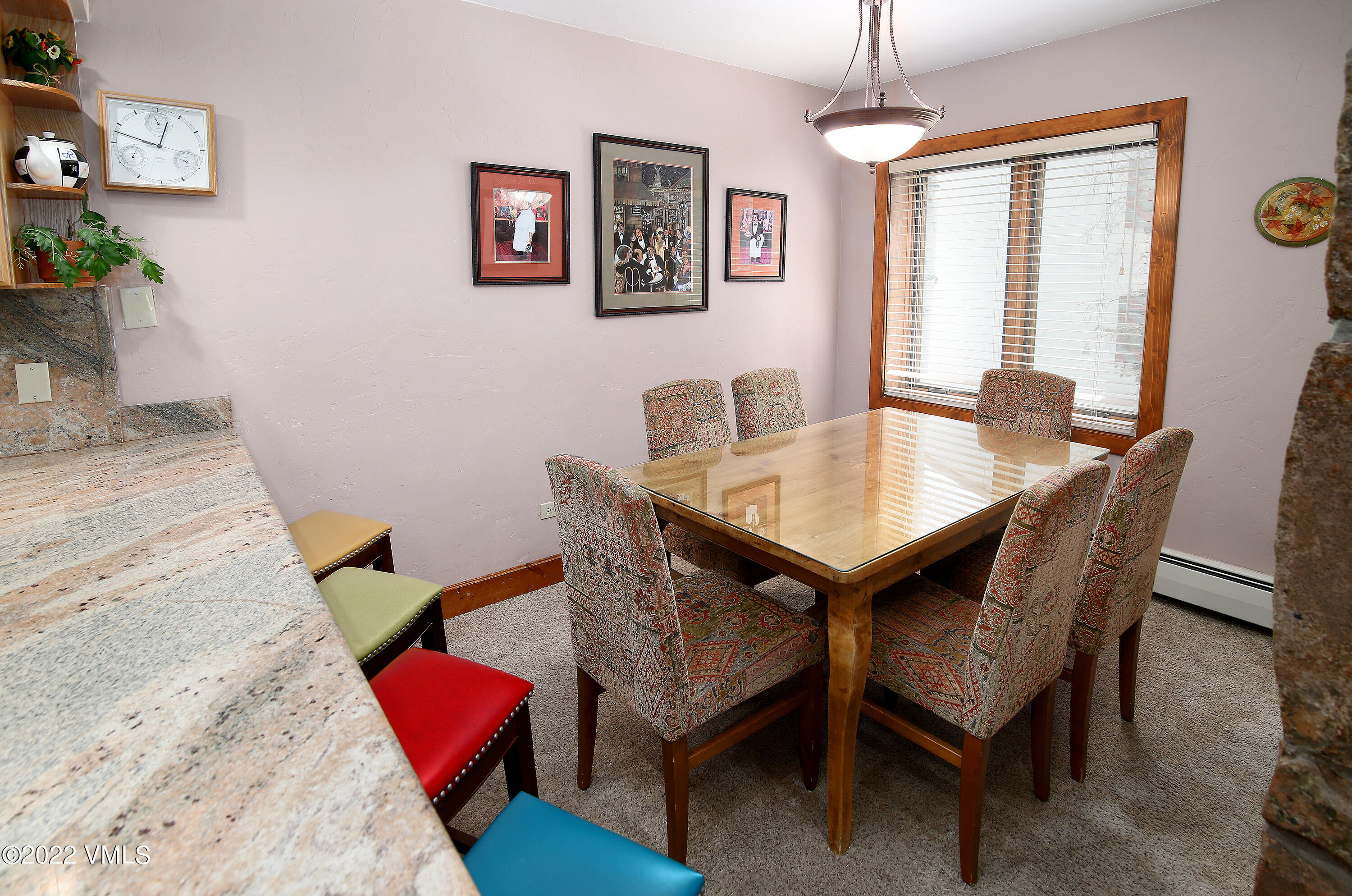 548 South Frontage Road West, Unit 105 Vail, CO 81657 - Photo 6 of 19 a view of a dining room with furniture and window
