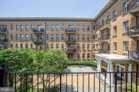 a view of a building from a balcony
