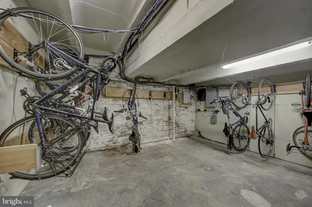 a view of a patio with table and chairs and potted plants
