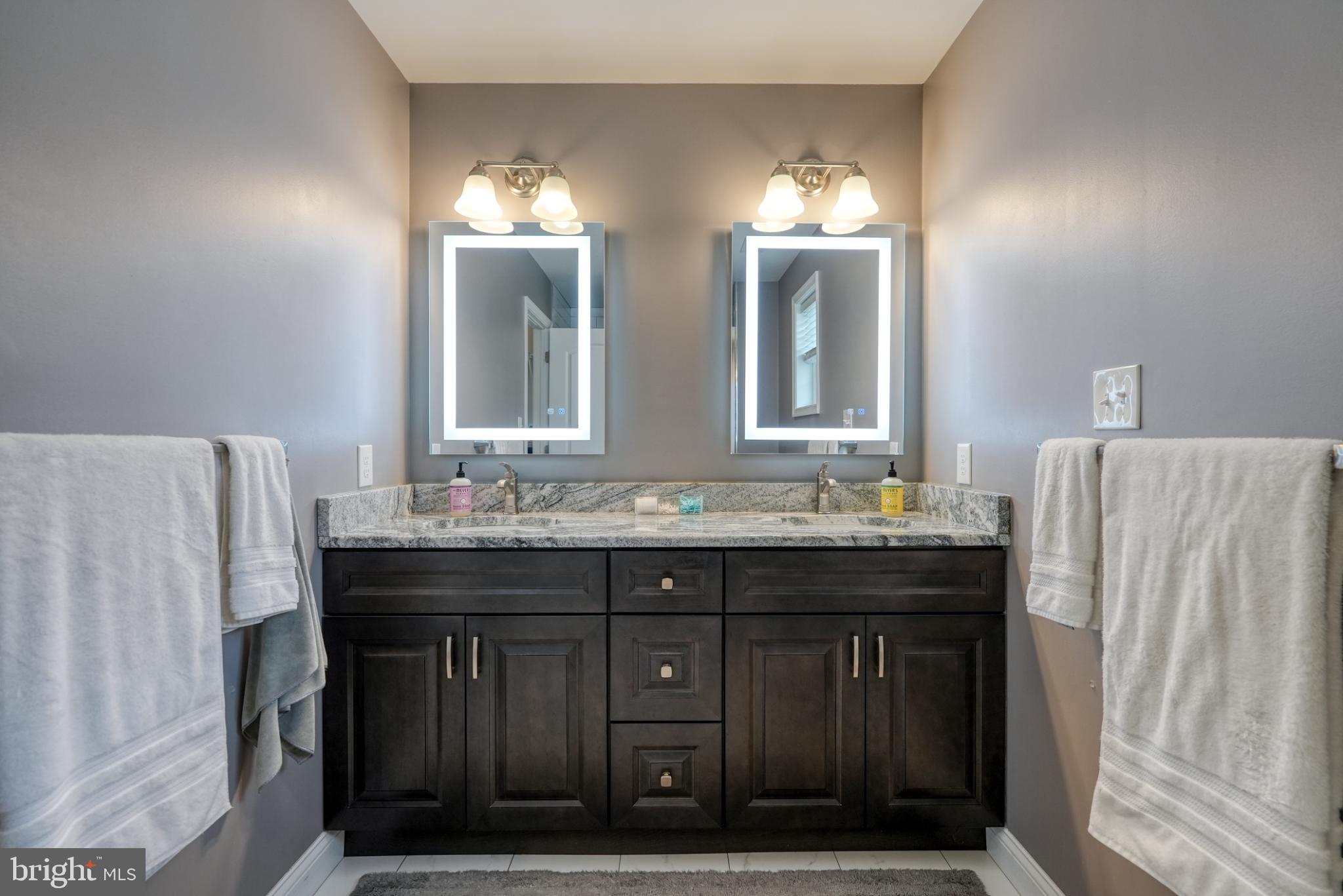 813 5th Avenue Croydon, PA 19021 - Photo 46 of 58 Elegant dual vanity in serene tones.