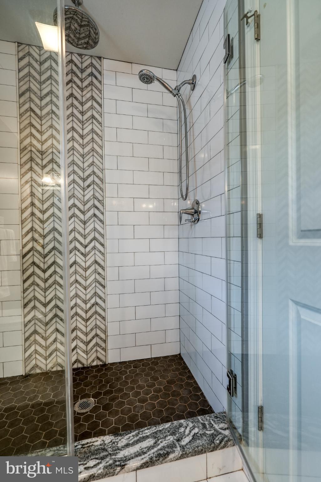 813 5th Avenue Croydon, PA 19021 - Photo 48 of 58 Sleek shower with modern tile accents.