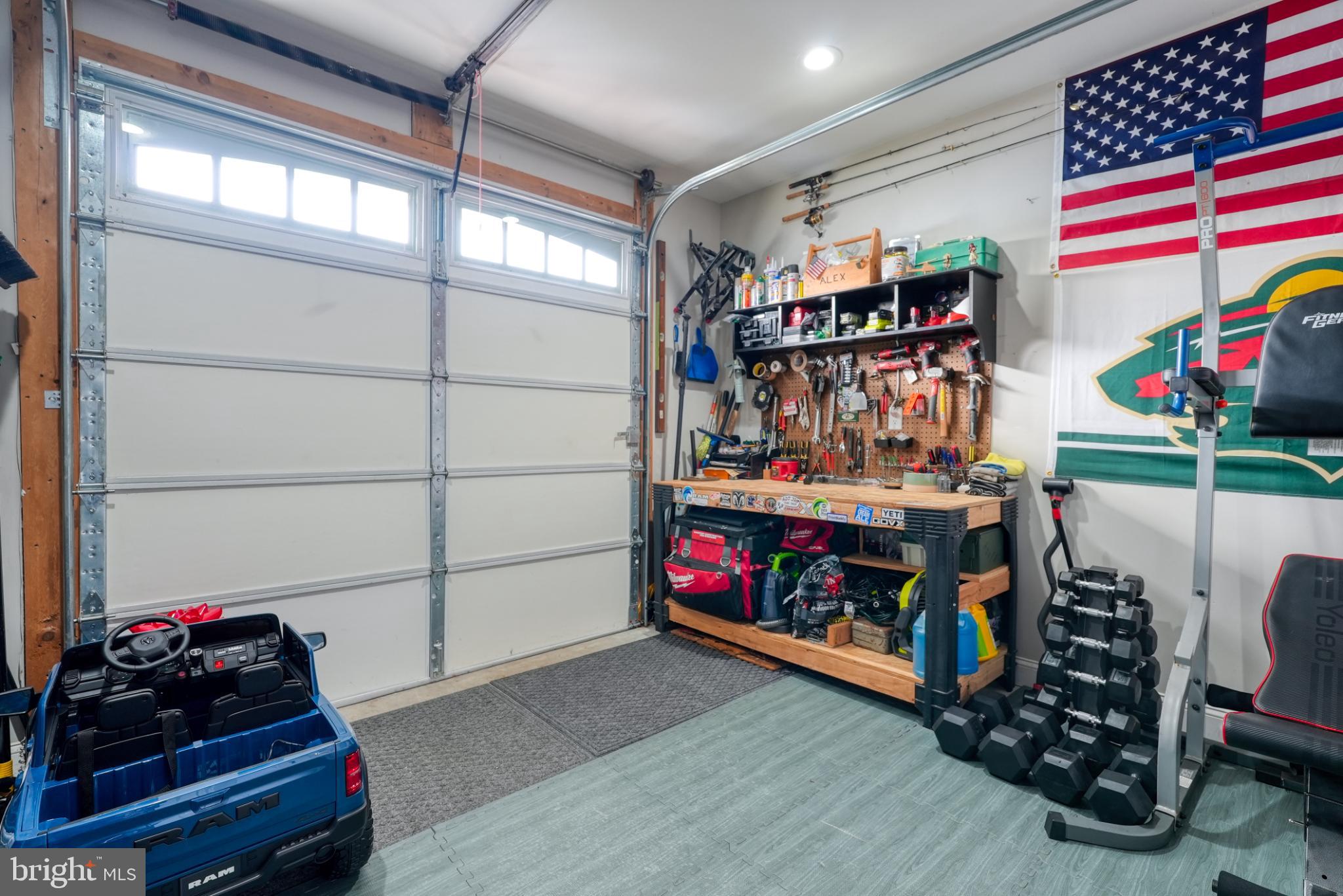 813 5th Avenue Croydon, PA 19021 - Photo 53 of 58 Functional garage with organized tools and gear.