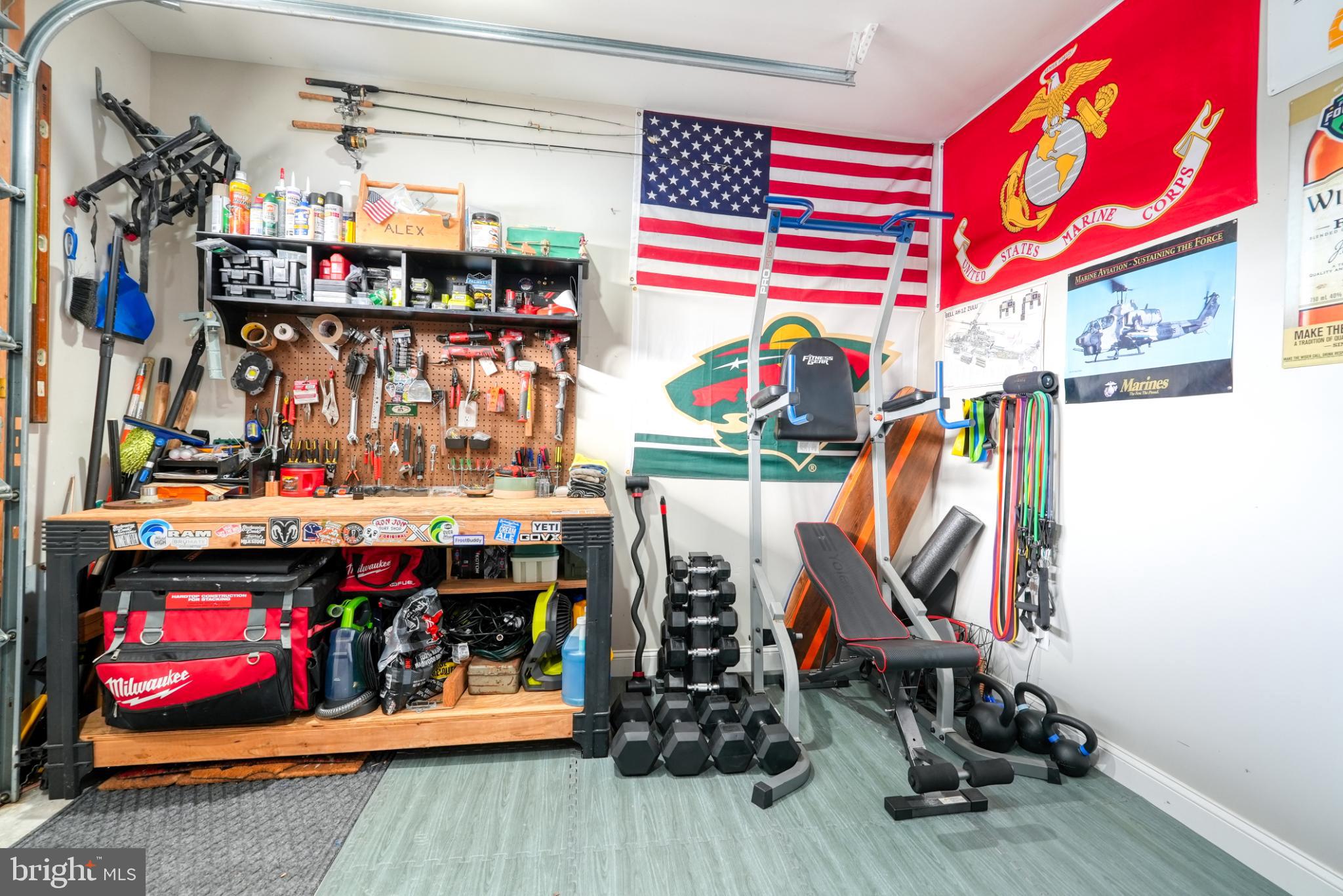 813 5th Avenue Croydon, PA 19021 - Photo 55 of 58 Functional garage with tools and fitness gear.