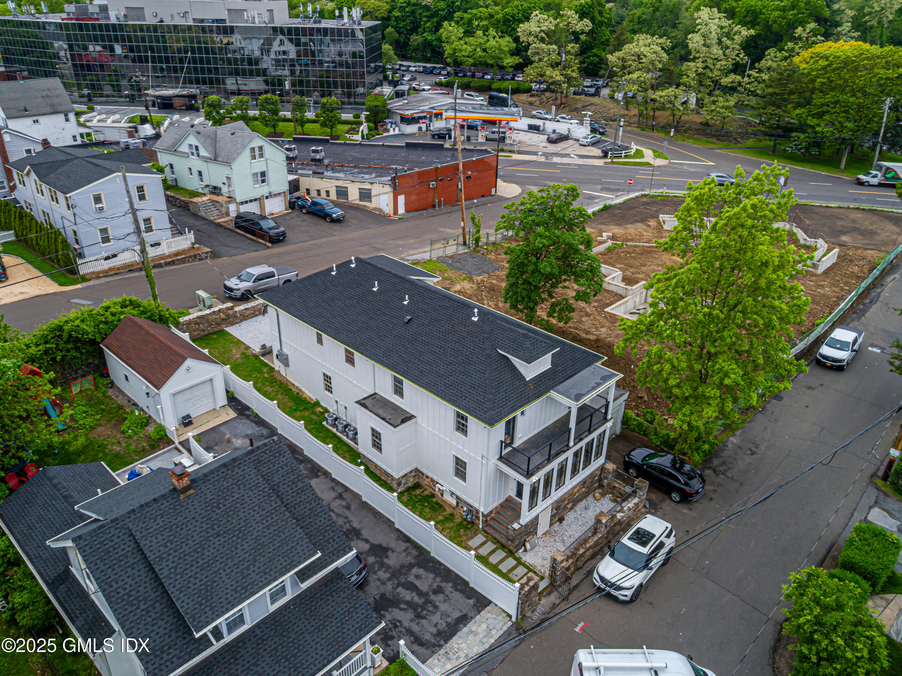 28 Columbus Avenue Greenwich, CT 06830 - Photo 2 of 7 an aerial view of a house with garden space and street view