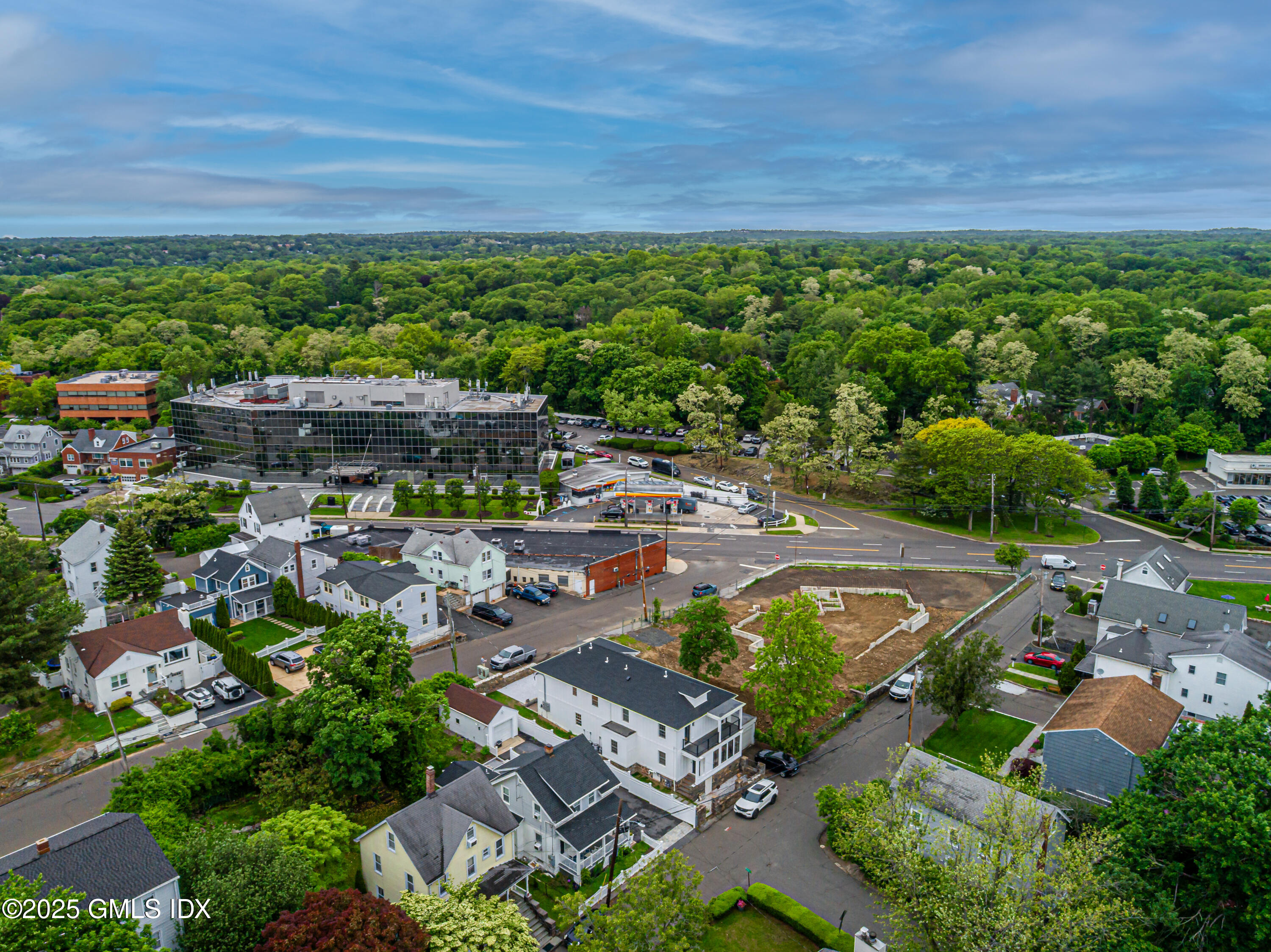 28 Columbus Avenue Greenwich, CT 06830 - Photo 4 of 7 a view of a swimming pool with a patio and a yard