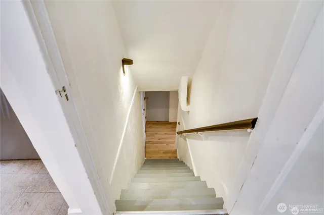 a view of a hallway with staircase