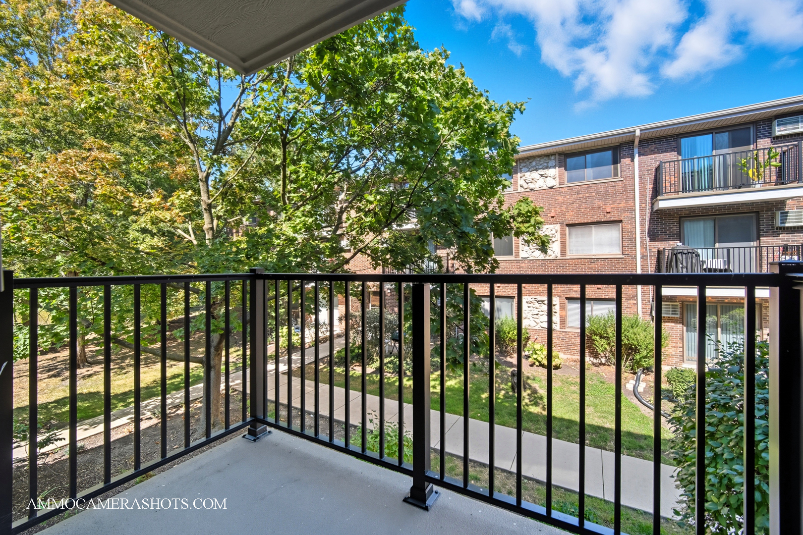 1240 South Lorraine Road, Unit 2D Wheaton, IL 60189 - Photo 11 of 19 a city view from a balcony