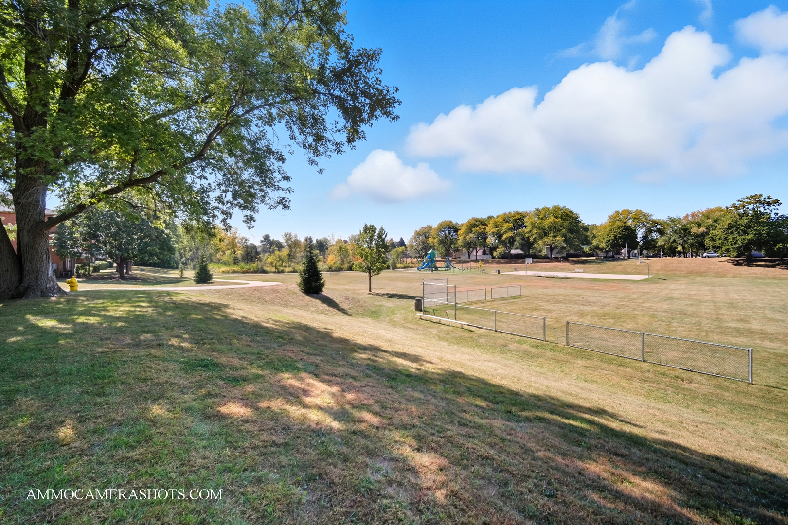 1240 South Lorraine Road, Unit 2D Wheaton, IL 60189 - Photo 19 of 19 a view of lake with a yard