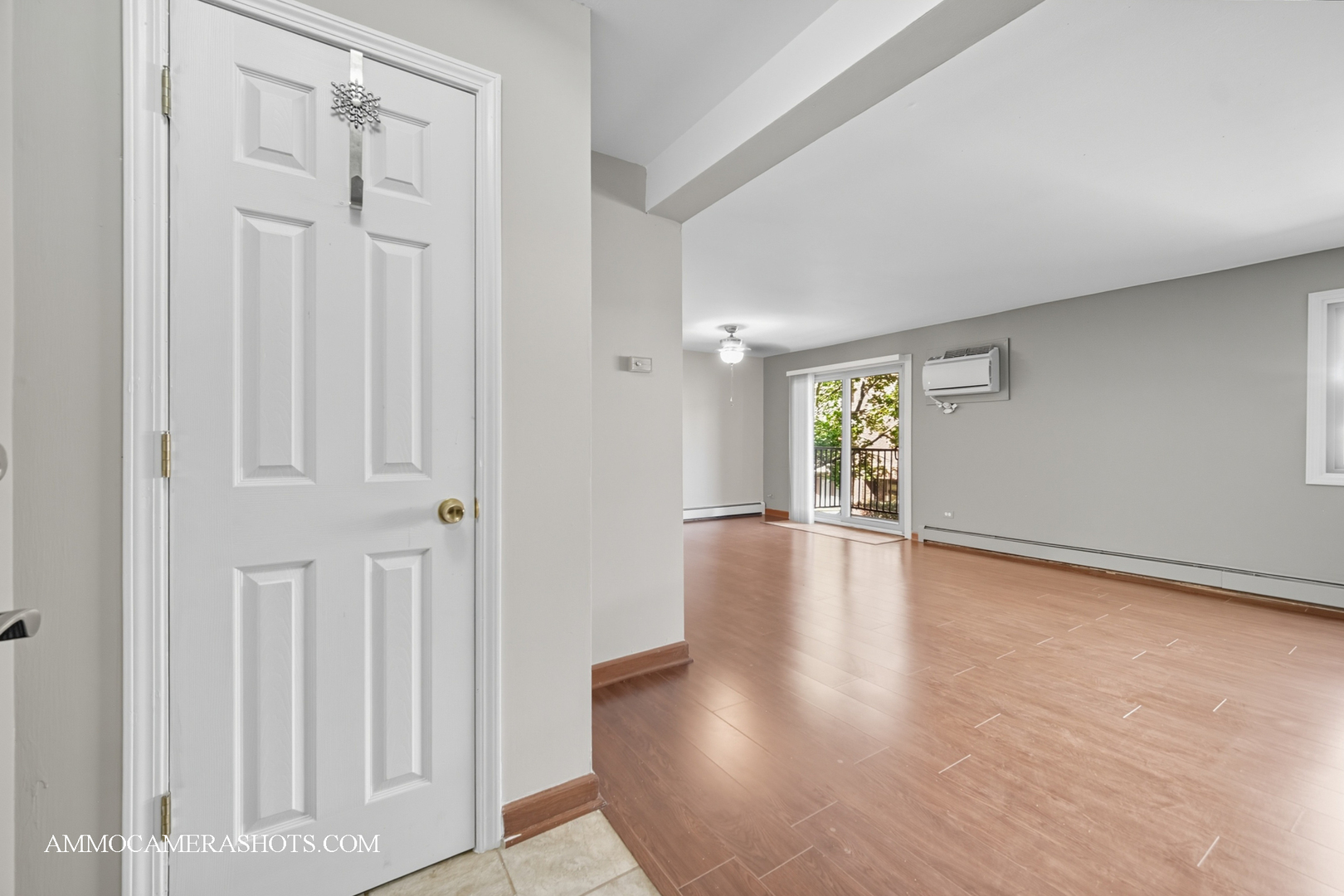 1240 South Lorraine Road, Unit 2D Wheaton, IL 60189 - Photo 3 of 19 a view of livingroom with hardwood