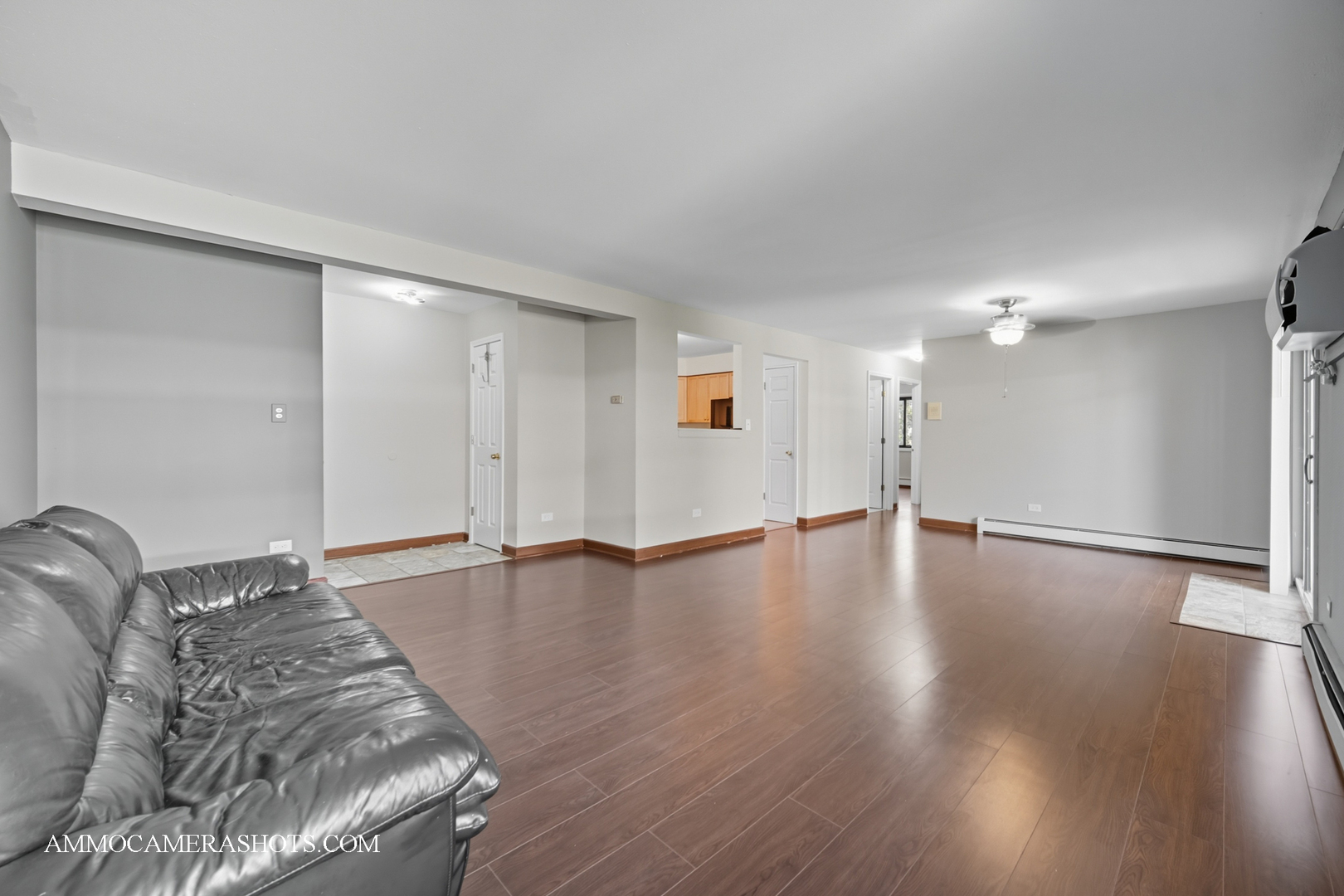 1240 South Lorraine Road, Unit 2D Wheaton, IL 60189 - Photo 7 of 19 a view of a livingroom with wooden floor