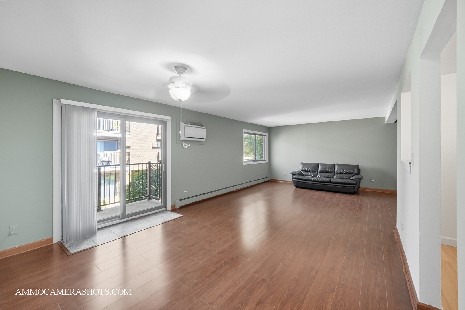 1240 South Lorraine Road, Unit 2D Wheaton, IL 60189 - Photo 10 of 19 a view of a livingroom with wooden floor