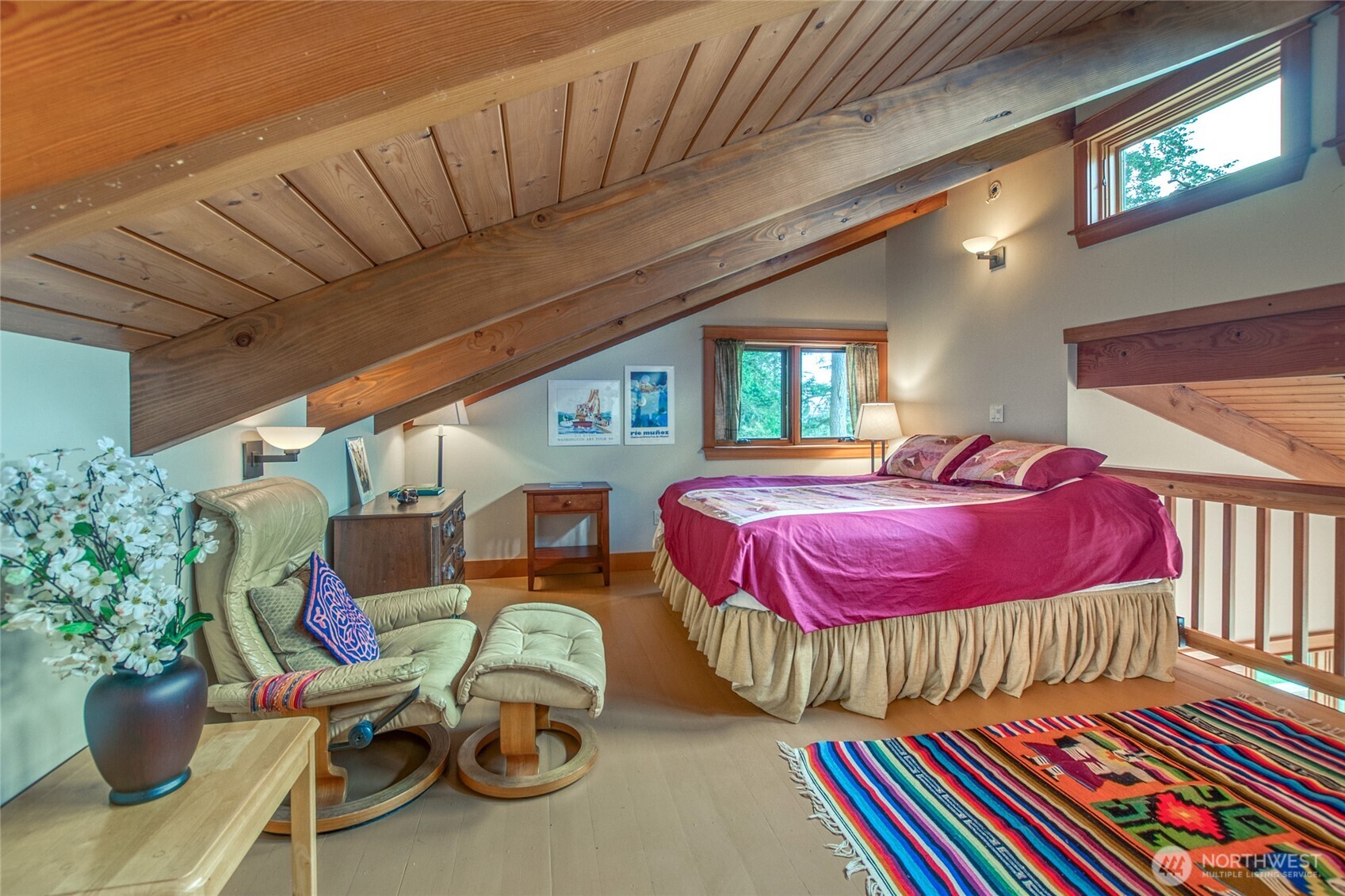 402 Cayou Valley Road Orcas Island, WA 98245 - Photo 37 of 40 a bedroom with furniture and a potted plant