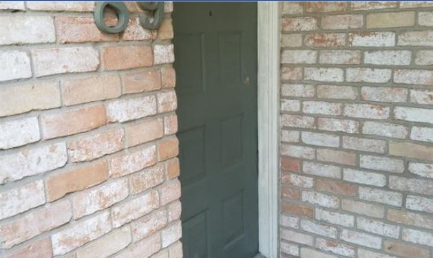 8100 Cambridge Street, Unit 89 Houston, TX 77054 - Photo 2 of 15 a brick building with a glass door