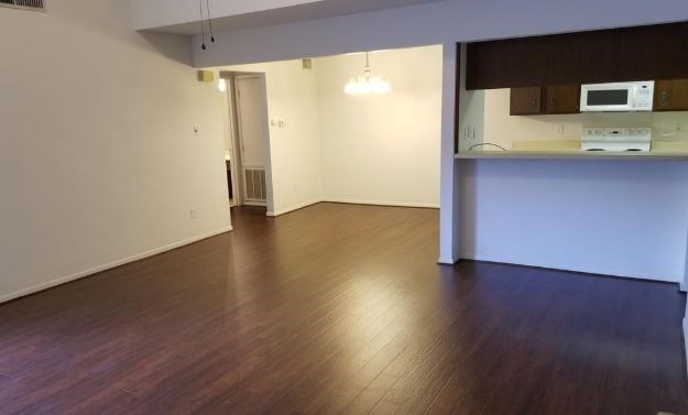 8100 Cambridge Street, Unit 89 Houston, TX 77054 - Photo 7 of 15 a view of a kitchen with a sink and a mirror