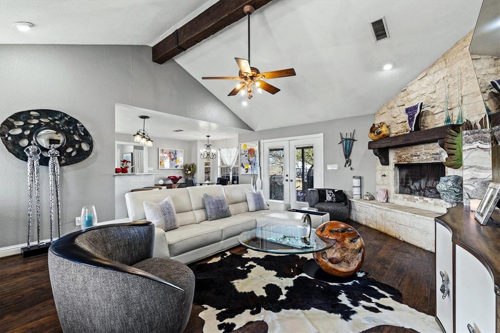 2590 Blackjack Road West Aubrey, TX 76227 - Photo 12 of 26 a living room with furniture and a fireplace