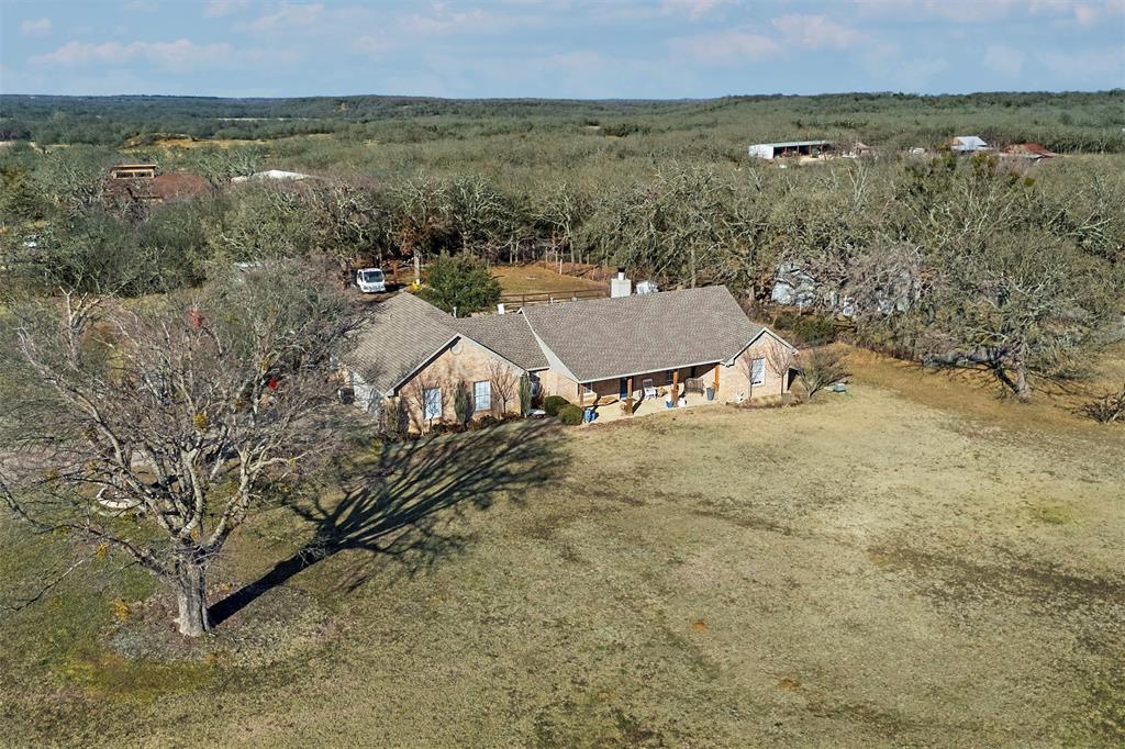 2590 Blackjack Road West Aubrey, TX 76227 - Photo 2 of 26 an aerial view of residential house with outdoor space