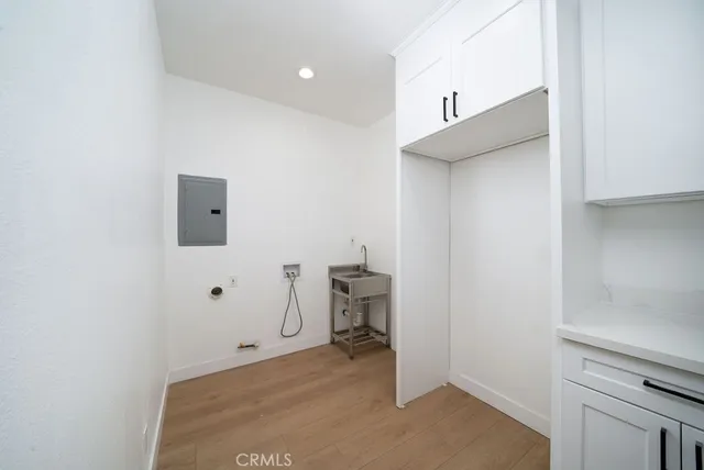 a view of hallway with washer and dryer