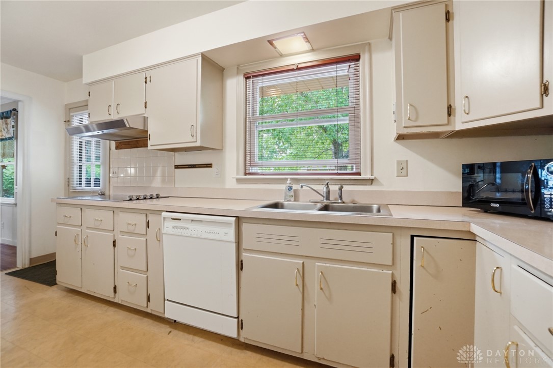 6119 Flemington Road Dayton, OH 45459 - Photo 18 of 76 Functional kitchen with ample cabinet space awaits your culinary creativity.