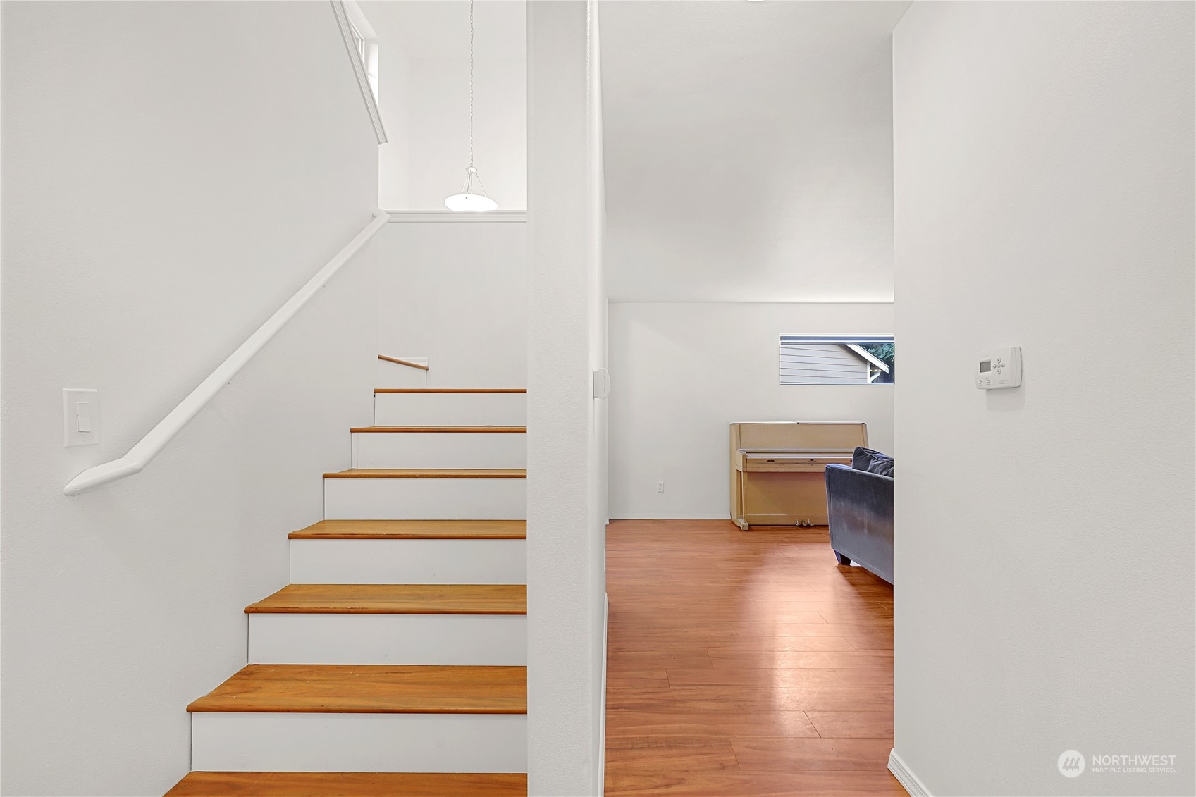 5600 55th Loop Southeast Olympia, WA 98513 - Photo 11 of 33 a view of entryway and hall with wooden floor