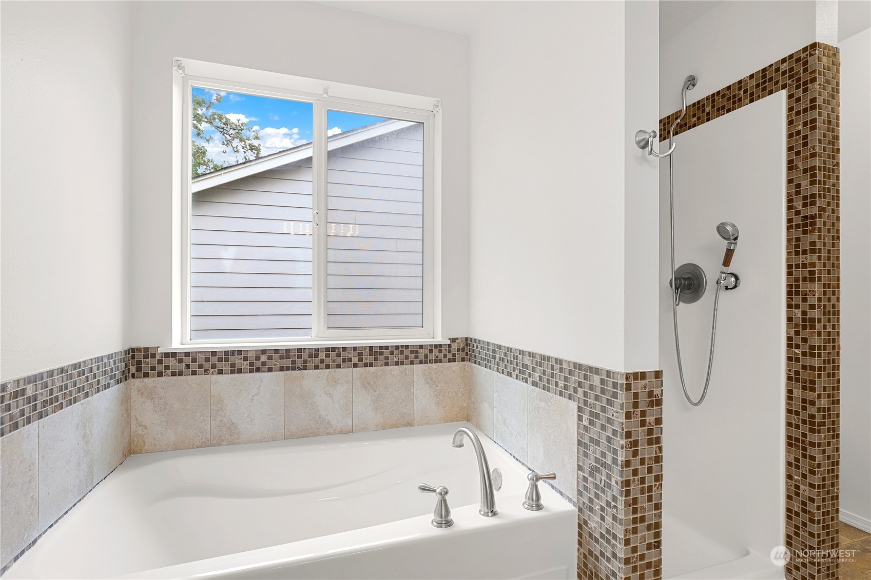 5600 55th Loop Southeast Olympia, WA 98513 - Photo 14 of 33 a bathroom with a bathtub and a shower