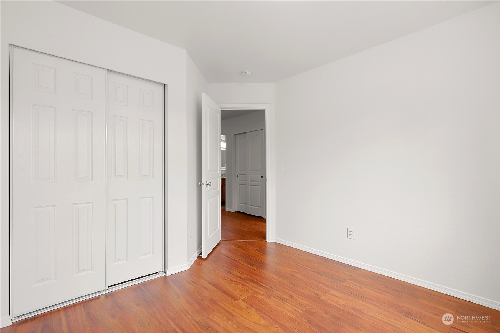 5600 55th Loop Southeast Olympia, WA 98513 - Photo 18 of 33 a view of a room with wooden floor