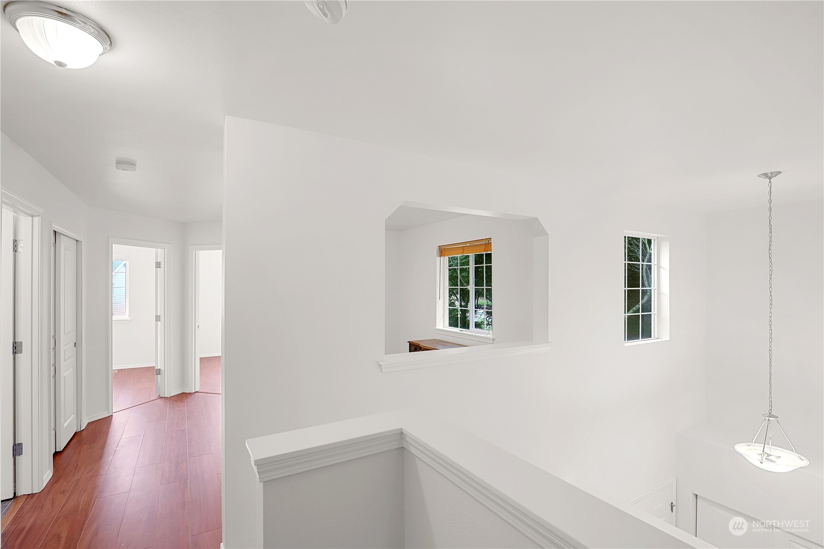 5600 55th Loop Southeast Olympia, WA 98513 - Photo 21 of 33 wooden floor in an empty room with a window