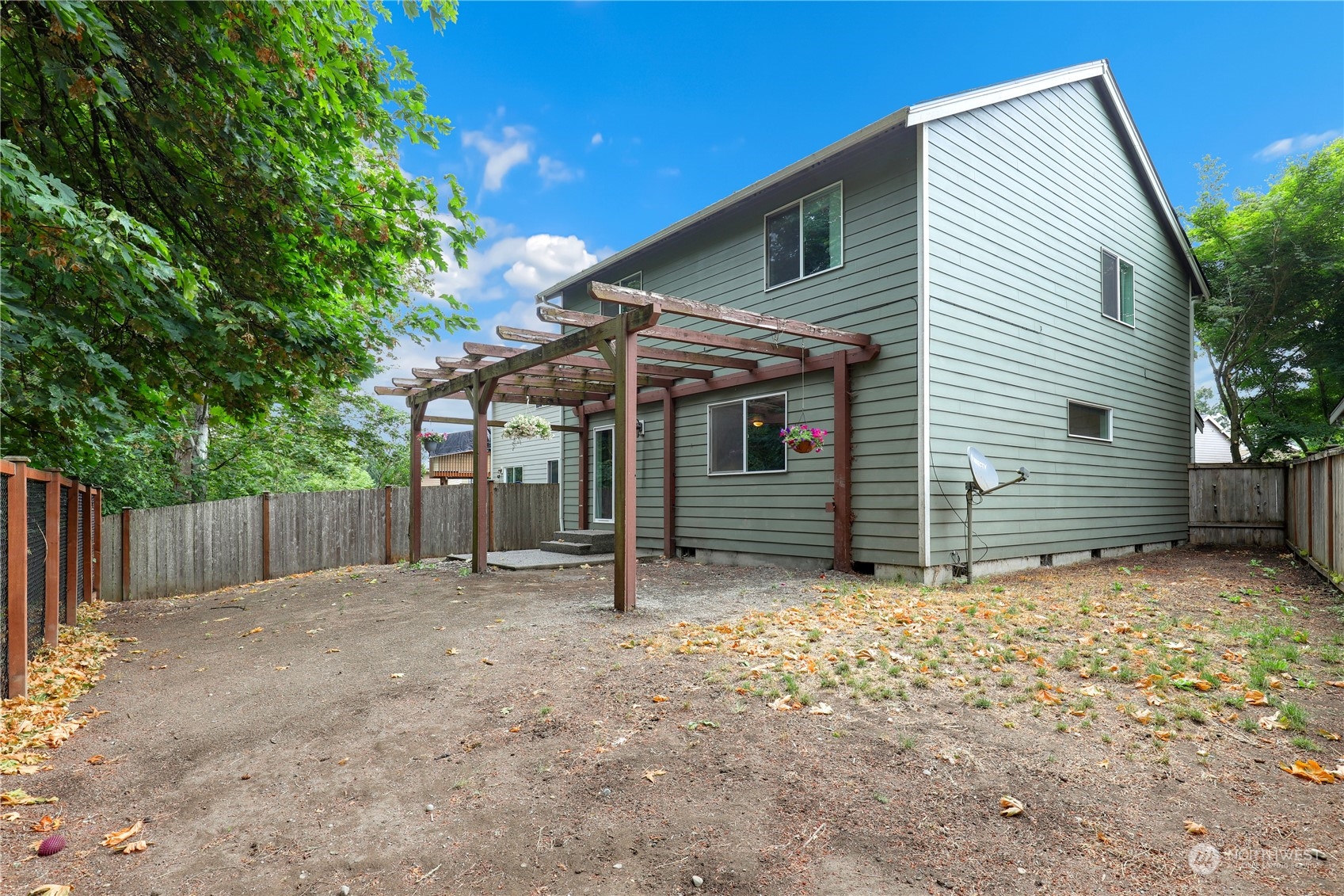 5600 55th Loop Southeast Olympia, WA 98513 - Photo 30 of 33 a view of a house with a fence